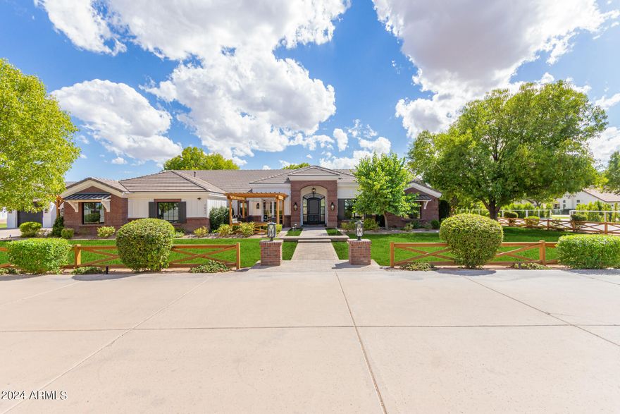 Beautiful Ranch Estate in a one of a kind neighborhood is coming available. This Home is generously priced below Current Market Appraisal. The property delivers total privacy in a small  6 home Gated 1 acre minimum Community. Horse property with NO HOA. Unique opportunity to own an original owner/builder estate. Property has been totally remodeled top to bottom while being meticulously maintained. The estate sits on1 acre with an additional ⅓ acre that is ready to be whatever the next owner needs. Barn, Stables, RV Garage, Sports Court, there is plenty of room to comfortably fit everything.
Both convenience and exclusivity are in this thoughtfully designed home built for large families or multi-generational families. Main Floor includes  3Bedrooms 2 1/2 Baths. See ''More'' Basement includes an additional theater room/family room, 2 baths, 2 bedrooms, and its own laundry room and storage. The attached Casita offers its own entrance, Full kitchen, Bathroom, laundry facilities, family room/Studio and even a small private yard. In the detached garage you'll again find endless possibilities with an air-conditioned storage room and additional room for private gym, office, whatever your needs are. Plenty of mature landscaping throughout the property with freshly remodeled amenities also make this home unique.  This Estate offers mature Citrus orchard of fresh oranges, grapefruit, and tangelos that bring the quaint smell of spring to your backyard. A Large outdoor covered patio with Gas BBQ, beautiful seating area, and Gas Firepit. Entertain to your hearts desire with free-standing gazebo and 30,000-gallon heated pool and spa make it ideal for all your entertaining dreams.  Bring your horses, boats, Rv's etc. as there is room enough for everything.  Detached garage offers tall Boat garage. This Ranch Estate embodies the best of both worlds offering NO HOA while also nestled in a gated enclave. Top-of-the-line Gilbert Regional Park just a walk down the street. Shopping and Freeway Access 5 Minutes away. What a Great Property with location, location, location!