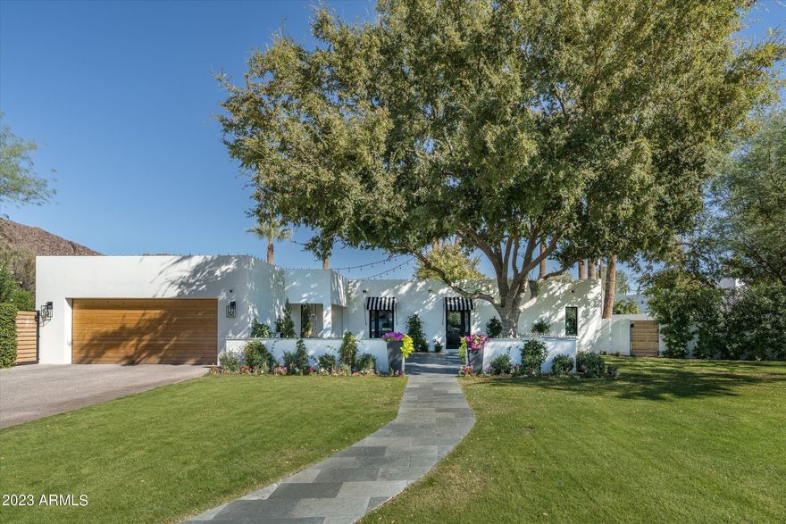 Nestled at the base of a private Cut de Sac in the heart of Arcadia Proper, this gem of a remodel is a rare find today's market. Featuring 5 bedrooms / 3 baths / bright open split floor plan on newly a half acre of captivating outdoor living spaces for your year round enjoyment. The expansive backyard with towering mature palm tress assist in capturing the surrounding beauty and Camelback Mountain views. For those of you who don't yet know ARCADIA, this neighborhood is Arizona's most prized location and the epicenter of top tier schools, fine local dining, world class resorts and boutique shopping. High in demand and offering an unparalleled blend of suburban tranquility and urban energy - you won't want to miss this one of a kind opportunity.