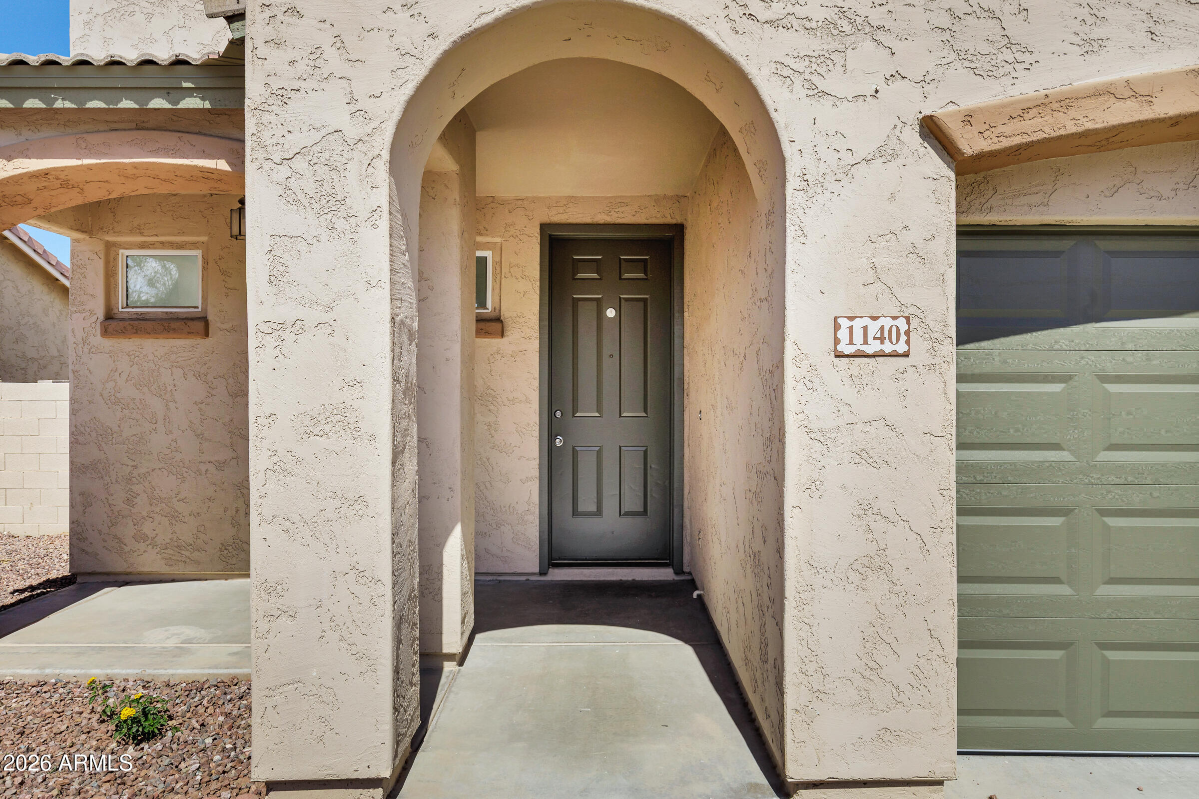 1140 E FERRARA Street