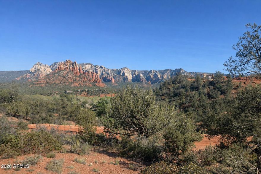 Introducing Sky Ridge Estates, Sedona's newest luxury enclave, ideally situated in the heart of town. This premier hilltop homesite captures sweeping, unobstructed panoramic red rock views, offering an extraordinary blend of privacy, serenity, and seclusion. Thoughtfully positioned within close proximity to Sedona's vibrant cultural and lifestyle amenities, including the new town square, city park, museum, and the iconic Tlaquepaque Arts & Shopping Village, as well as fine dining, upscale boutiques, and resort experiences. Optional access to Los Abrigados Resort & Spa provides a full suite of amenities, including a fitness center, tennis courts, restaurants, and a private Oak Creek-front park. Community infrastructure is currently underway, with paved roads and underground utilities in progress and completion anticipated by mid-2026--presenting a rare opportunity to secure a legacy homesite in one of Sedona's most desirable new developments.