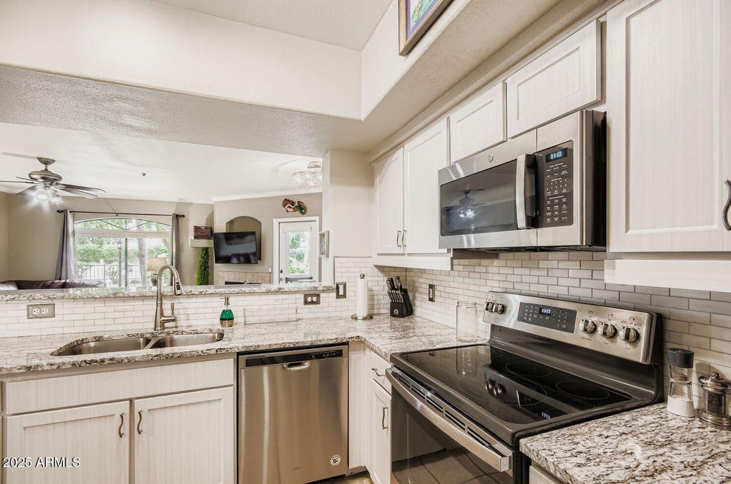 Photo of 15095 N Thompson Peak Parkway #1005, Scottsdale, AZ 85260 (MLS # 6951393)