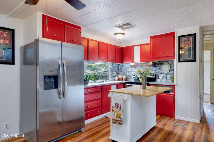 Centrally located and move-in ready, this updated 3-bedroom, 2-bathroom split floor plan is perfect as a primary residence, long-term rental, or Airbnb. The well-cared-for property features no HOA, owned solar, city water and sewer, and natural gas availability. Recent major upgrades include a 200-amp electrical panel and a new AC/heat split system installed within the last two years. Outside, you'll find ample space for RV parking complete with convenient water and electrical hookups, all situated just minutes from everything in town.