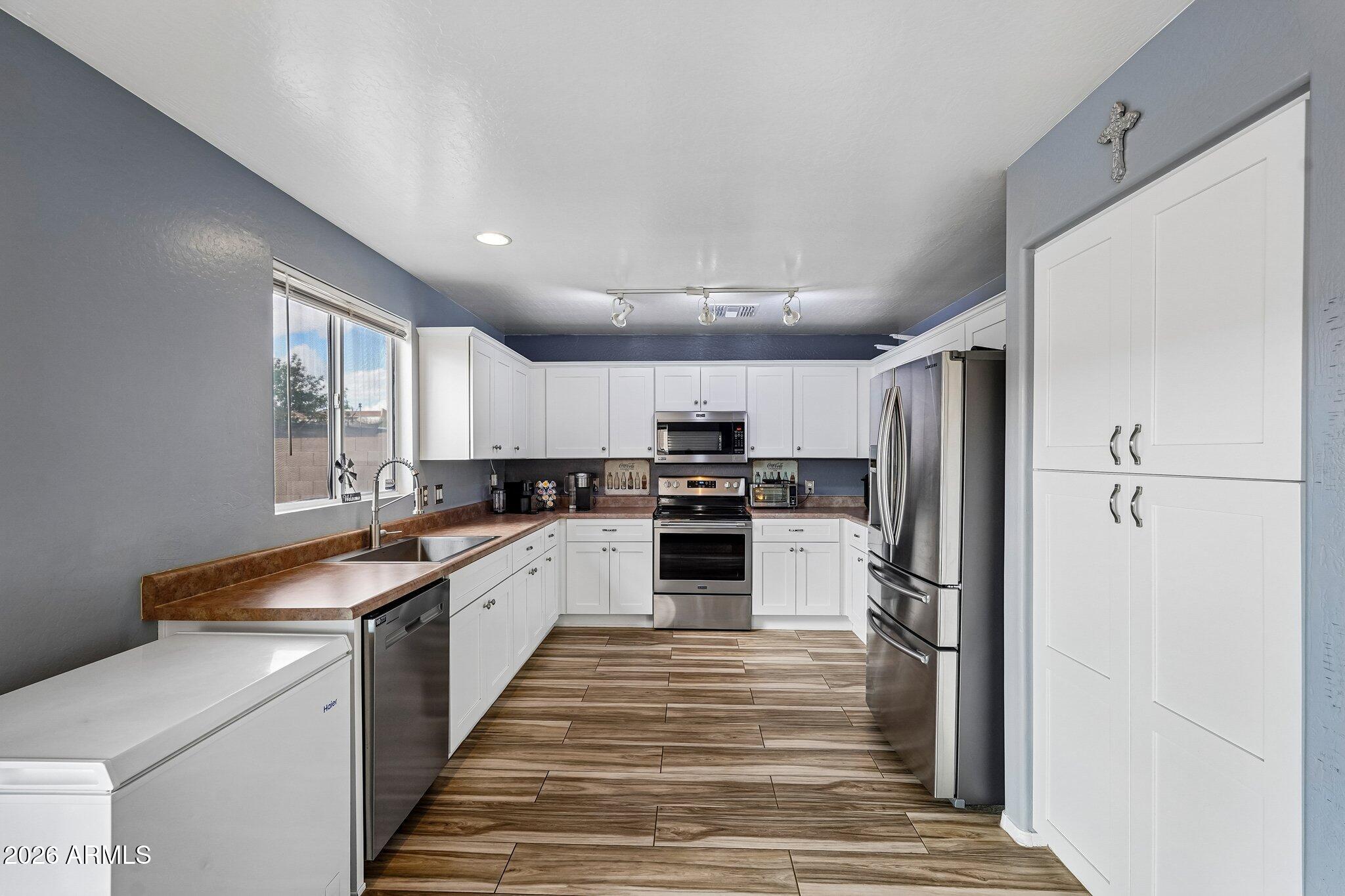 12917 W CHERRY HILLS Drive