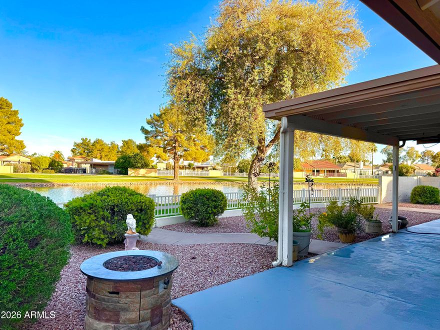This one is a showstopper! Don't miss the opportunity to enjoy one of the most peaceful and breathtaking lake views in Sun Lakes (85248). Wake up every morning with a cup of coffee while overlooking the tranquil waters right in your backyard.

Situated on a quiet cul-de-sac lot, this beautifully maintained 2-bedroom, 2-bath home offers easy, low-maintenance living on a generous lot and is completely move-in ready. The home features new roof, new carpeting, fresh interior paint, new ceiling fans, an updated hall bathroom shower, a cozy eat-in kitchen for two, and a spacious living room perfect for entertaining friends and neighbors.

During the cooler months, gather around the warm fireplace and enjoy relaxing evenings with loved ones. Located in the highly desirable active adult community of Sun Lakes, residents enjoy A+ golf courses, a clubhouse with monthly activities, a fully equipped fitness center, pickleball, tennis, and a community swimming pool. You'll also appreciate the convenient location near excellent dining, shopping at Chandler Fashion Center, and easy access to the Interstate 10 and Loop 202 for quick travel anywhere in the Valley.

Come experience the lifestyle, the view, and the serenity this home truly has it all.