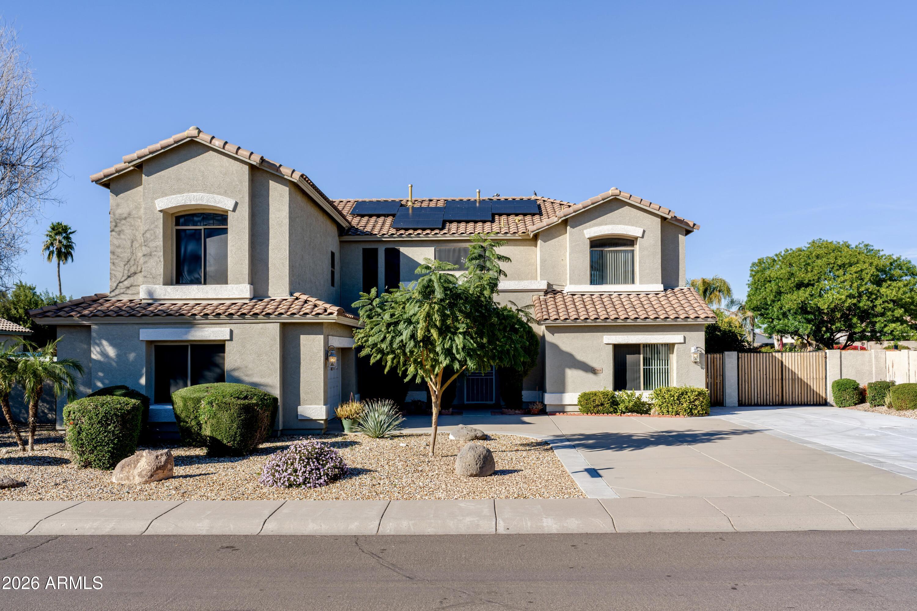 6788 W GREENBRIAR Drive