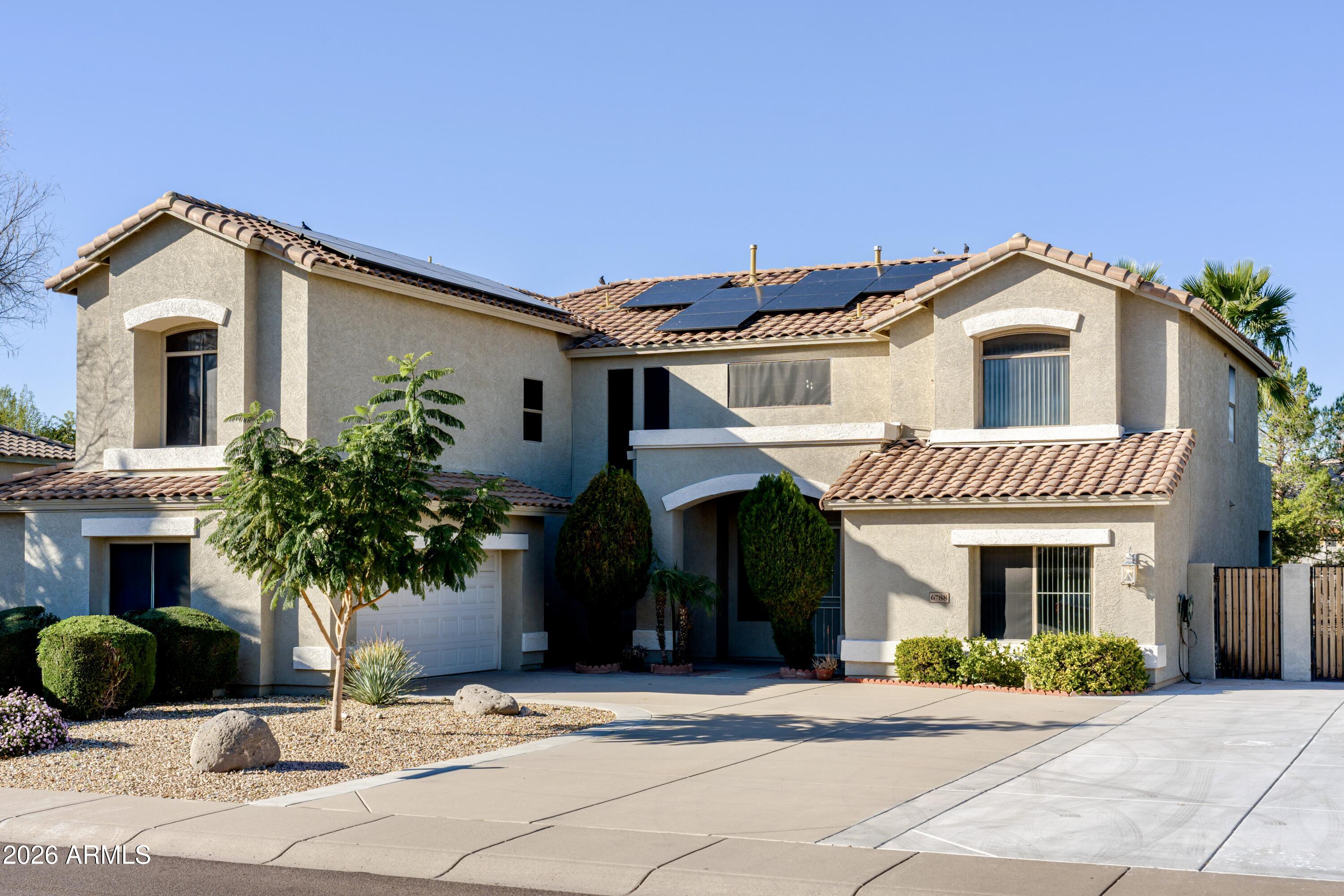 6788 W GREENBRIAR Drive