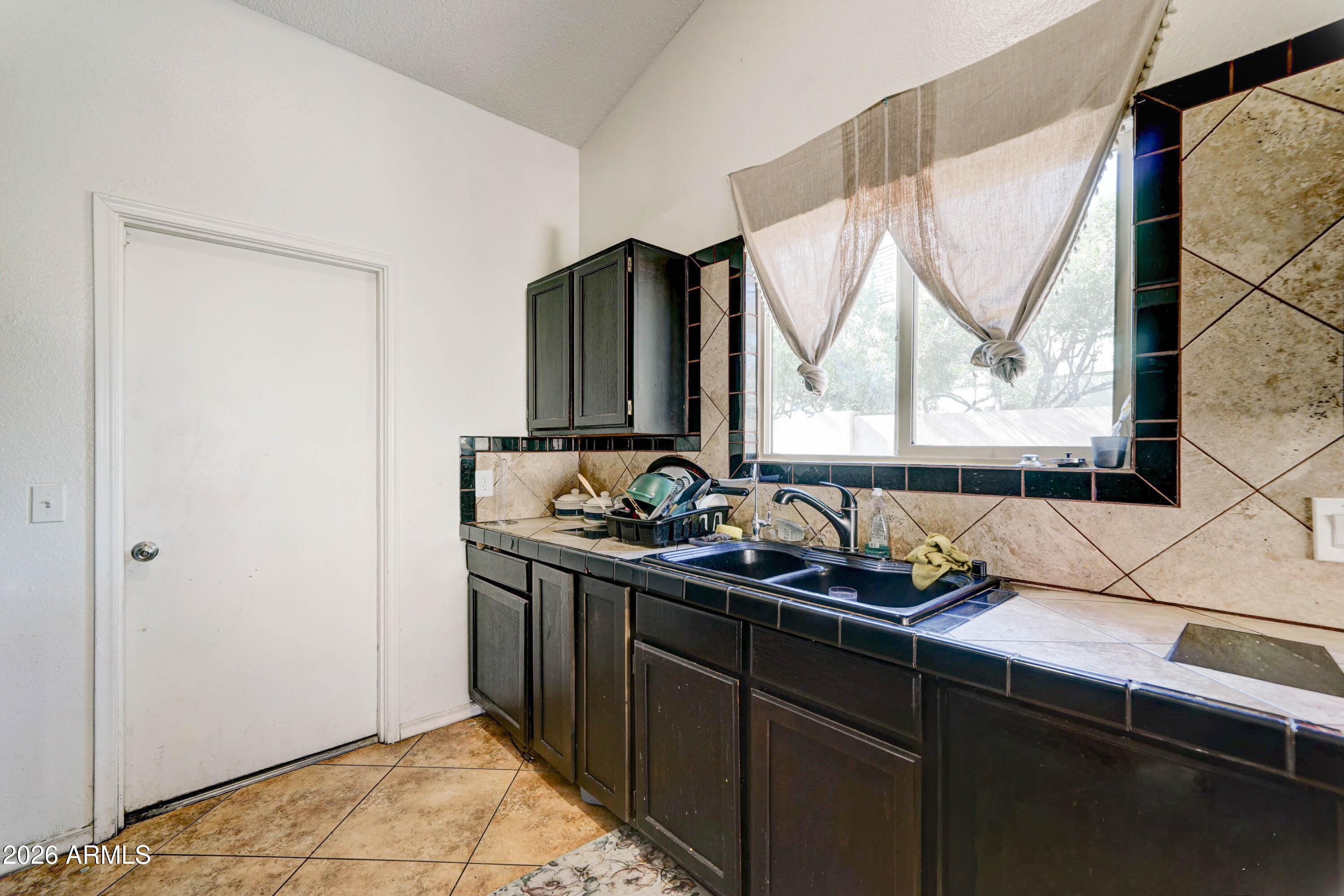 10002 W Mariposa Street