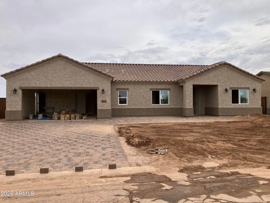 BRAND NEW!  You won't believe the upgrades in this 4 bedroom, 2 bath 1745 Sq. Ft. home with tile flooring throughout.  Spacious Kitchen with soft close drawers, Granite Counters, Stainless Steel Range, built in Microwave.  Great room with arcadia door opening up to oversized covered back patio with block privacy wall.  Split floorplan with large master suite, Tiled Shower, Double vanities and walk in closet with shelving.   Full 2nd bath with Tile surround and 3 other bedrooms or use 1 for an office!  Ceiling fans, recessed and pendant lighting throughout.  Indoor laundry with cabinets and granite work space.  Garage with remotes, fenced back yard with double gates on both sides.