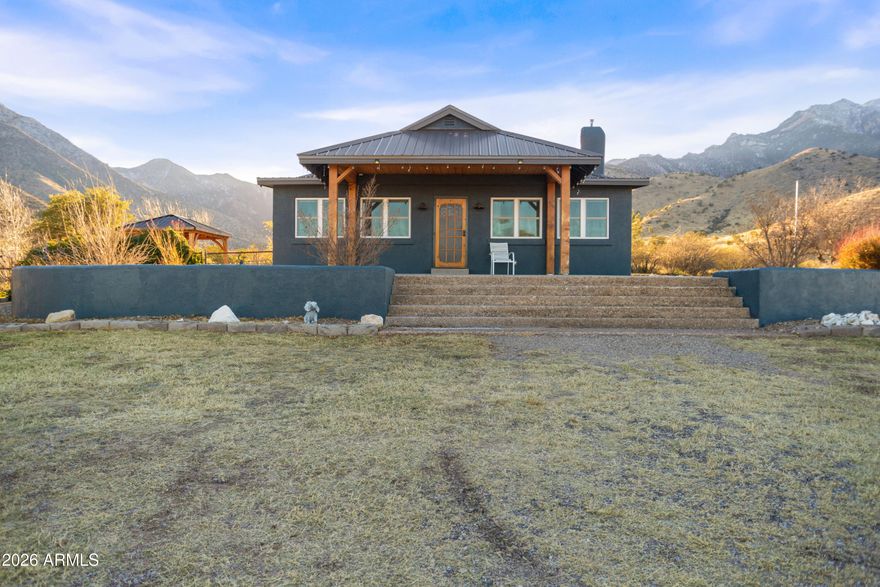 Come home from the hustle and bustle to your very own private retreat. Nestled at the bottom of the mountain with just shy of 4 acres. Nothing but the best views out of every corner of this remodeled 4 bed 2.5 bath home. The kitchen is a dream with Thermadore appliances and abundant storage. Enjoy the beautiful pellet stove to peacefully warm the great room. The large patios offer space for you to enjoy the views while relaxing outside, just a little ways down some steps you can even appreciate the stream running through the property. All of this brings wildlife, perfect for any nature lover.  Don't miss out on this rare opportunity to make an oasis home.