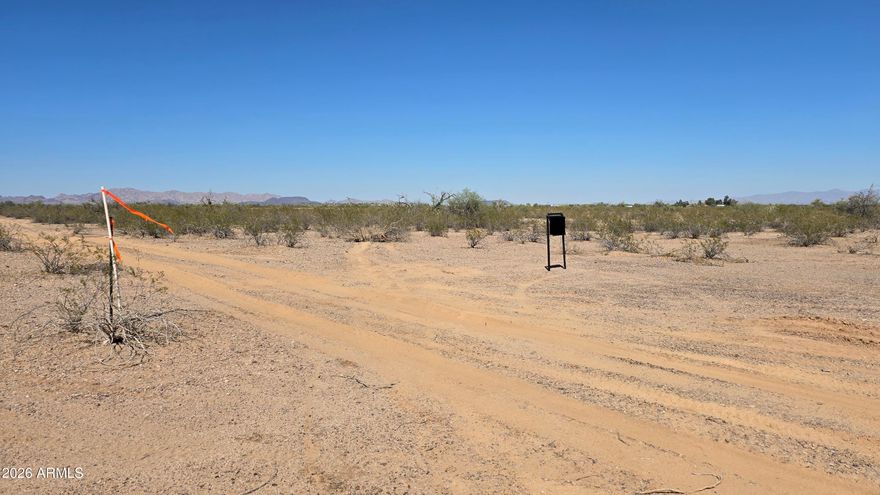 Rare 20-acre R-43 zoned parcel in the Saddle Mountain Ranch area featuring expansive desert and mountain views with flexible residential & rural use. Seller financing available. Power is in the area, check with APS for availability and connection details. Ideal for a custom home, manufactured home, ranch setup, or long-term land hold. Potential for future lot split or rezone to commercial. Seller owns 10 additional acres abutting & 5 acre parcels nearby. Near Hickman's Egg Farm and the beautiful new Saddle Mountain RV Park. Less than 2 miles to the 411th Ave. off ramp!  Parcel is located in partial floodplain, do your homework to see it is a buildable zone. Enjoy privacy, wide-open space, and a peaceful rural setting with strong long-term growth potential. Plan to come see this one today!