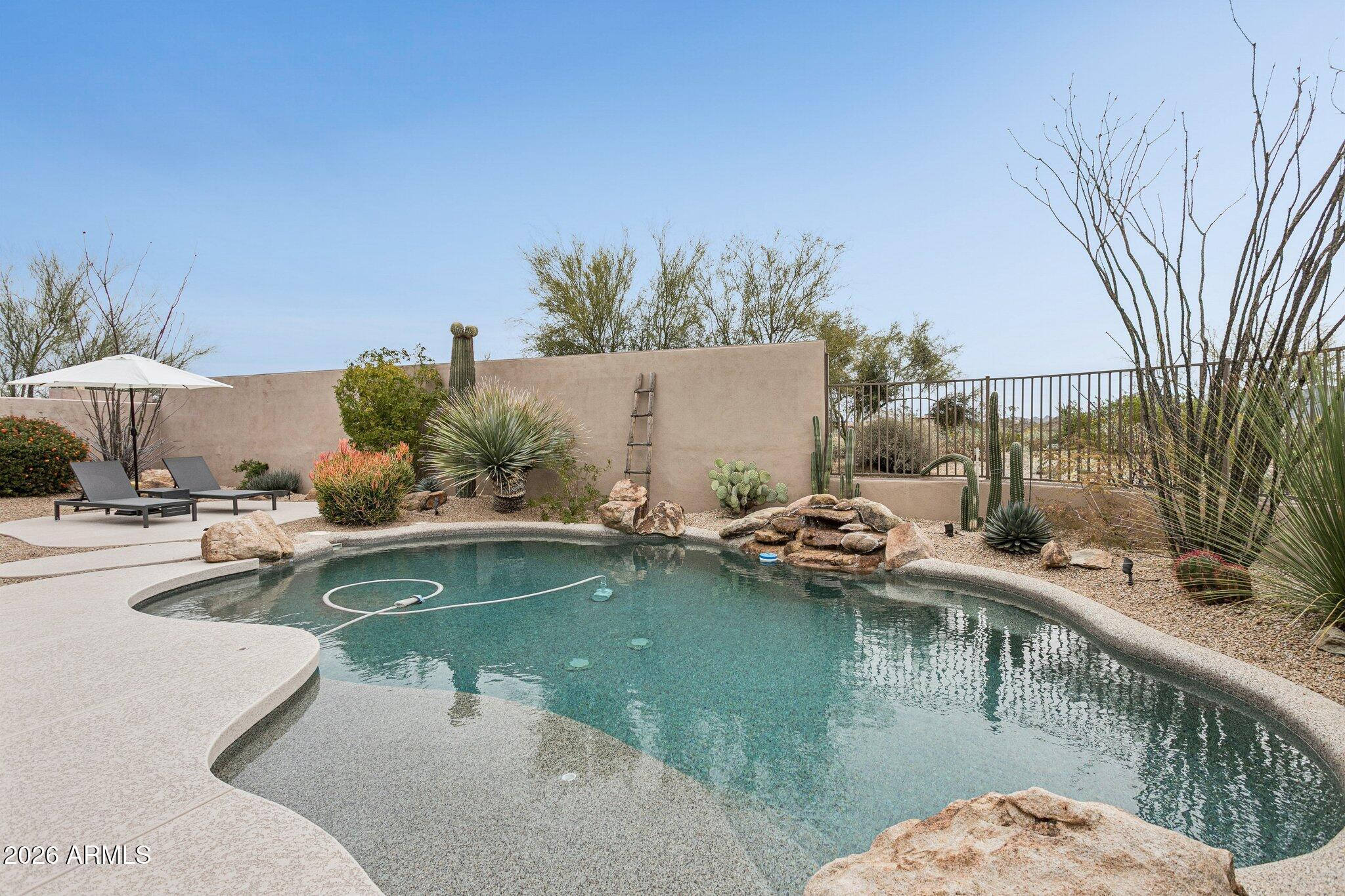 10831 E White Feather Lane