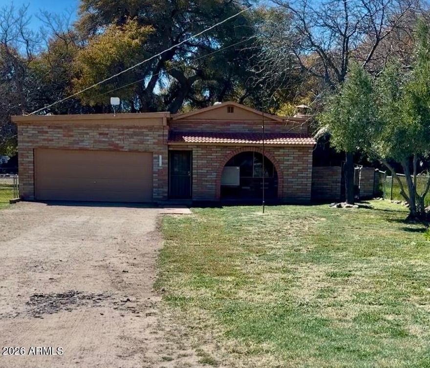 2 bedroom 2 bath, located in beautiful, quiet Yarnell in the Glen Ilah subdivision. Recently upgraded, with some dual-pane windows, new kitchen cabinets, fresh paint, and new baseboards. New vinyl wood flooring in the kitchen, bedrooms, hall, and bathrooms. Spacious kitchen with a large pantry and a living room with space for entertaining, has two steps to back part of house. Large fenced backyard with double gates, room for a garden. Large front yard with extra-long driveway and 20X18 garage. Mature fruit trees and shade trees. Evaporative cooling and gas heat. Block, stone, and some frame construction make for a very insulated space. Beautiful 1'' natural sandstone floors in the living room and natural stone fireplace, including options for gas, wood, or electric. Short distance to the post office. Beautiful mountain views from the living room.