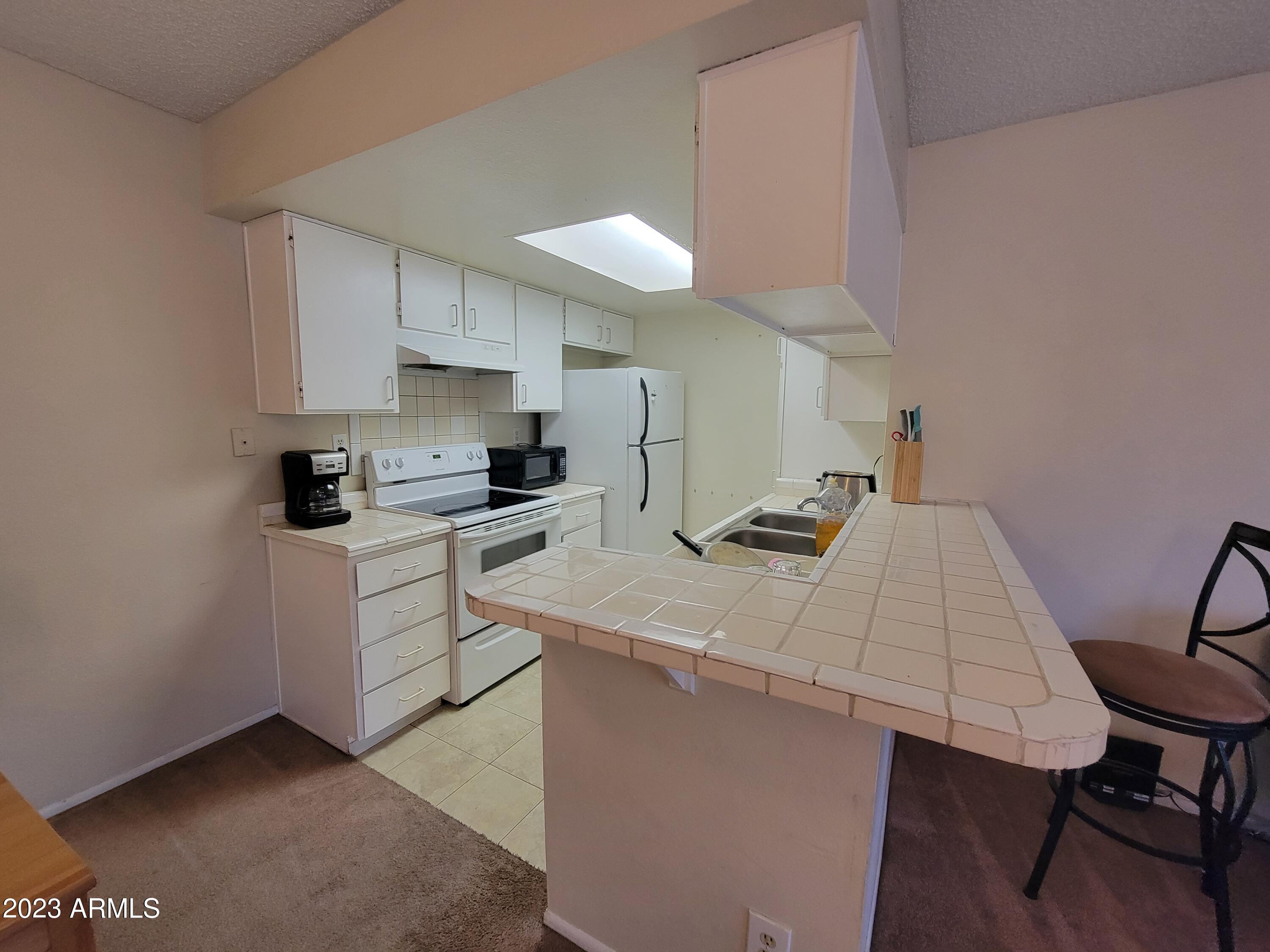 1111 E UNIVERSITY Drive 201