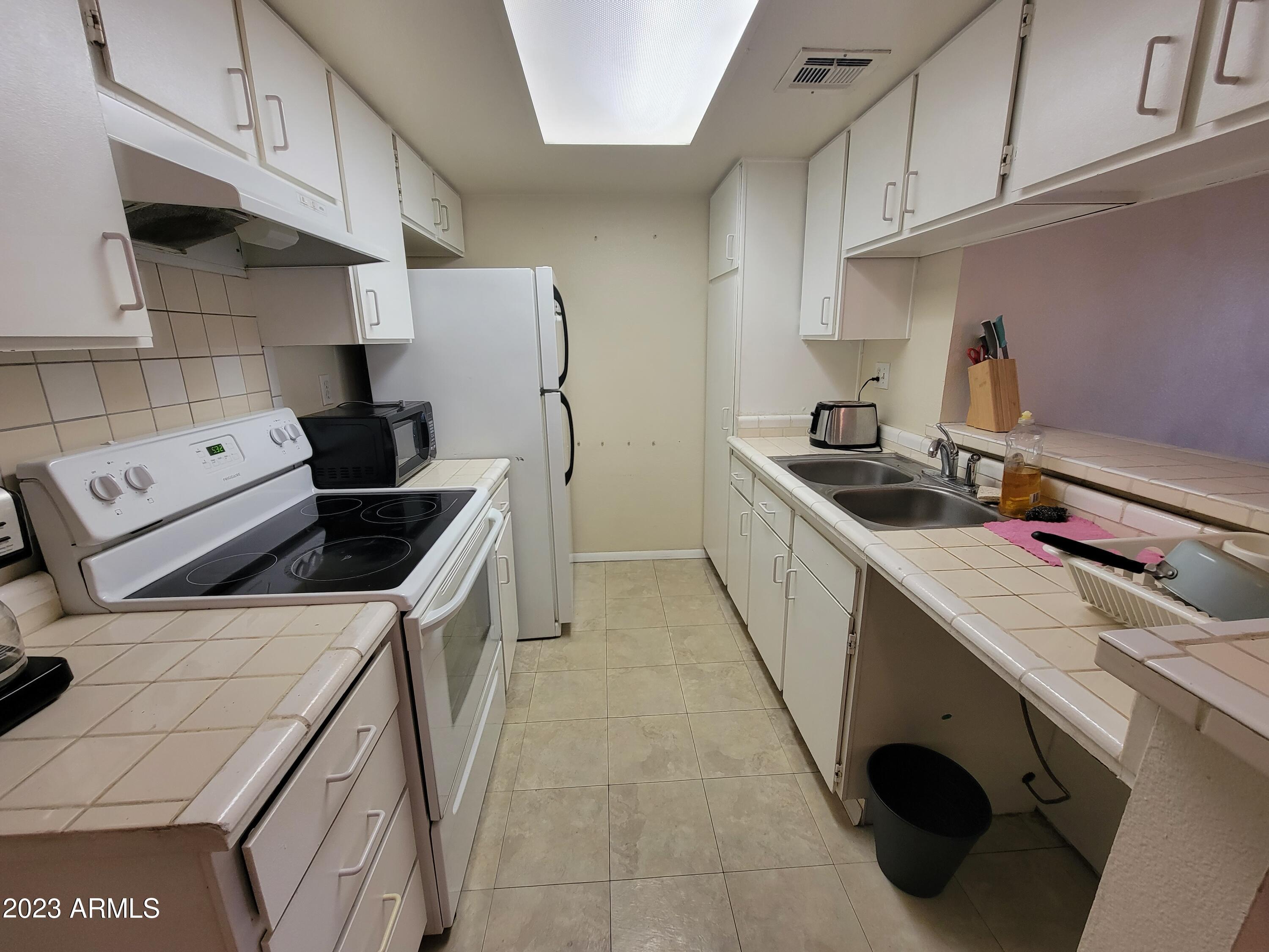 1111 E UNIVERSITY Drive 201