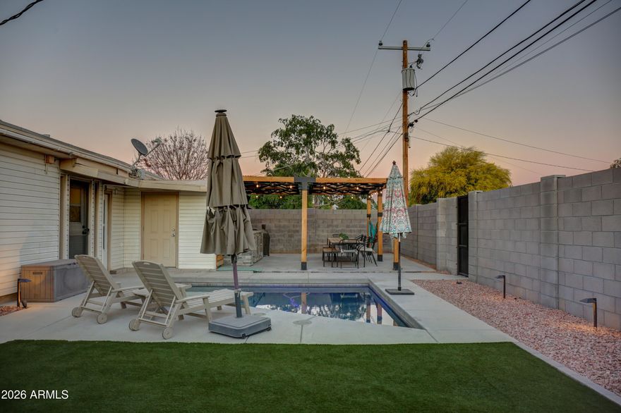 This beautifully updated 3-bedroom, 2-bathroom residence is situated in a premier Old Town location, just steps from the 15-mile Scottsdale Greenbelt and Continental Golf Club. The interior features dual living spaces, a renovated kitchen with granite countertops, updated bathrooms, and an oversized primary suite designed for comfort.

The highlight of the property is the comprehensively renovated backyard, a private, low-maintenance oasis perfect for entertaining. It boasts a new pool with a dedicated shade cover, premium synthetic turf, and a high-end pergola featuring a built-in BBQ. Combined with an expansive covered patio this no-HOA homeoffers a sophisticated lifestyle with effortless access to Scottsdale's best amenities.