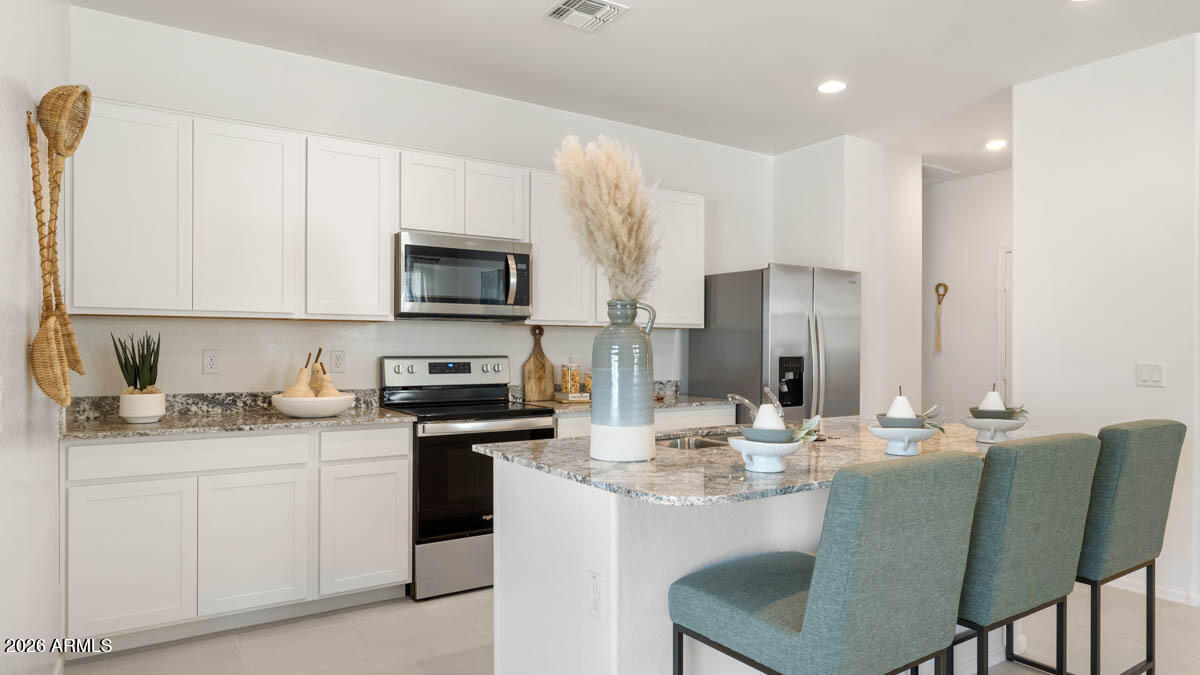 12560 W LOCUST Lane