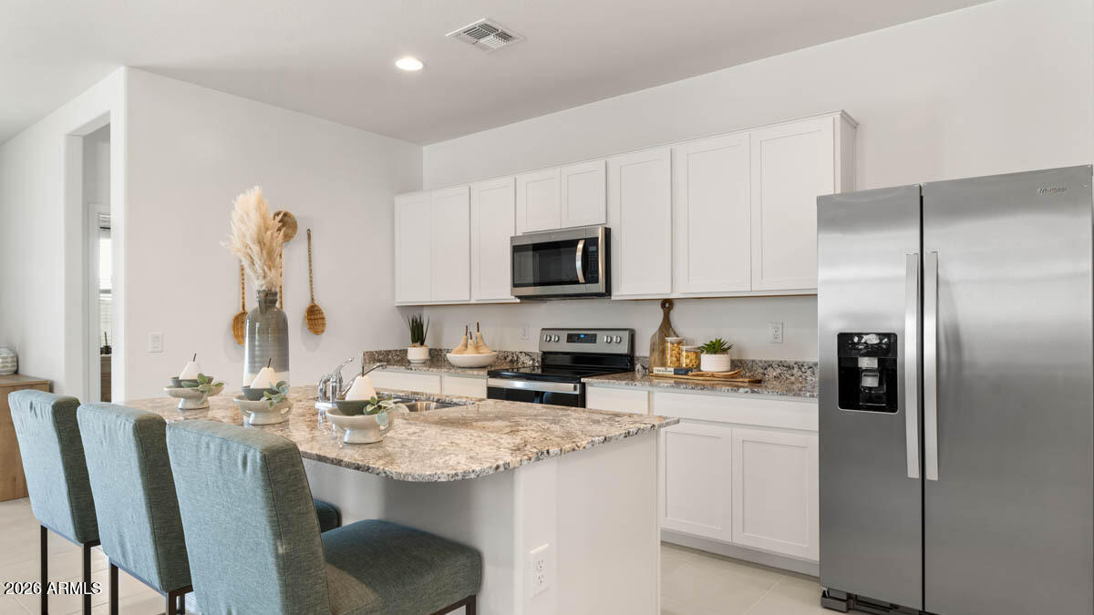 12560 W LOCUST Lane