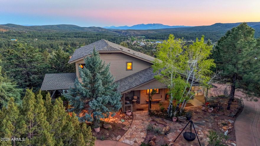 Amazing views from every angle, all situated on 1 acre. Open the door and immediately take in the breathtaking surroundings. This home features an open floor plan with beautiful hardwood floors throughout, cathedral ceilings, and solid wood doors.
The kitchen is truly impressive, offering upgraded décor appliances, quartz countertops, a warming drawer, beverage refrigerator, and upgraded cabinetry. The dining area features a cozy gas fireplace, and the great room opens to a covered deck, perfect for enjoying the views.
The primary bedroom includes dual closets with custom built-ins, a private deck, and a luxurious bath with dual sinks, a freestanding tub, and a glass shower, all with a view. All closets feature custom built-ins throughout the home. The main level also includes a den and half bath. Upstairs, you'll find three nicely sized guest rooms and a full bath.
Additional features include a 3-car garage, workshop, water softener, whole-house water filter, and two storage sheds. The property also offers plenty of space to walk around, a garden area, and fruit trees including plum, apricot, apple, and pear