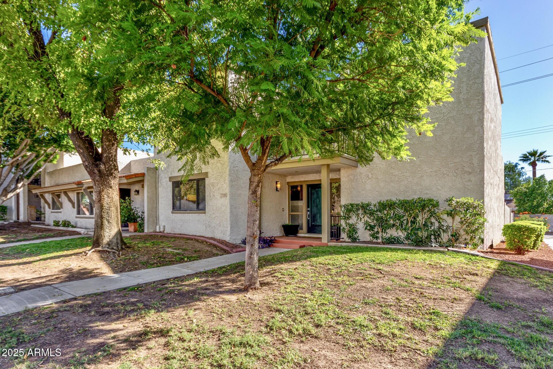 7729 E HARVARD Street