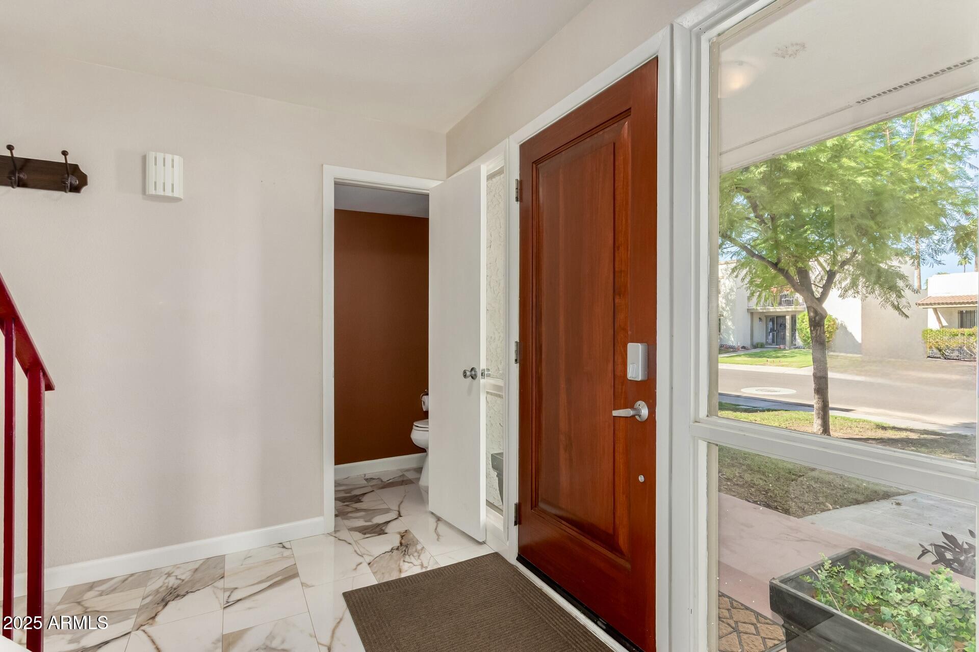 7729 E HARVARD Street