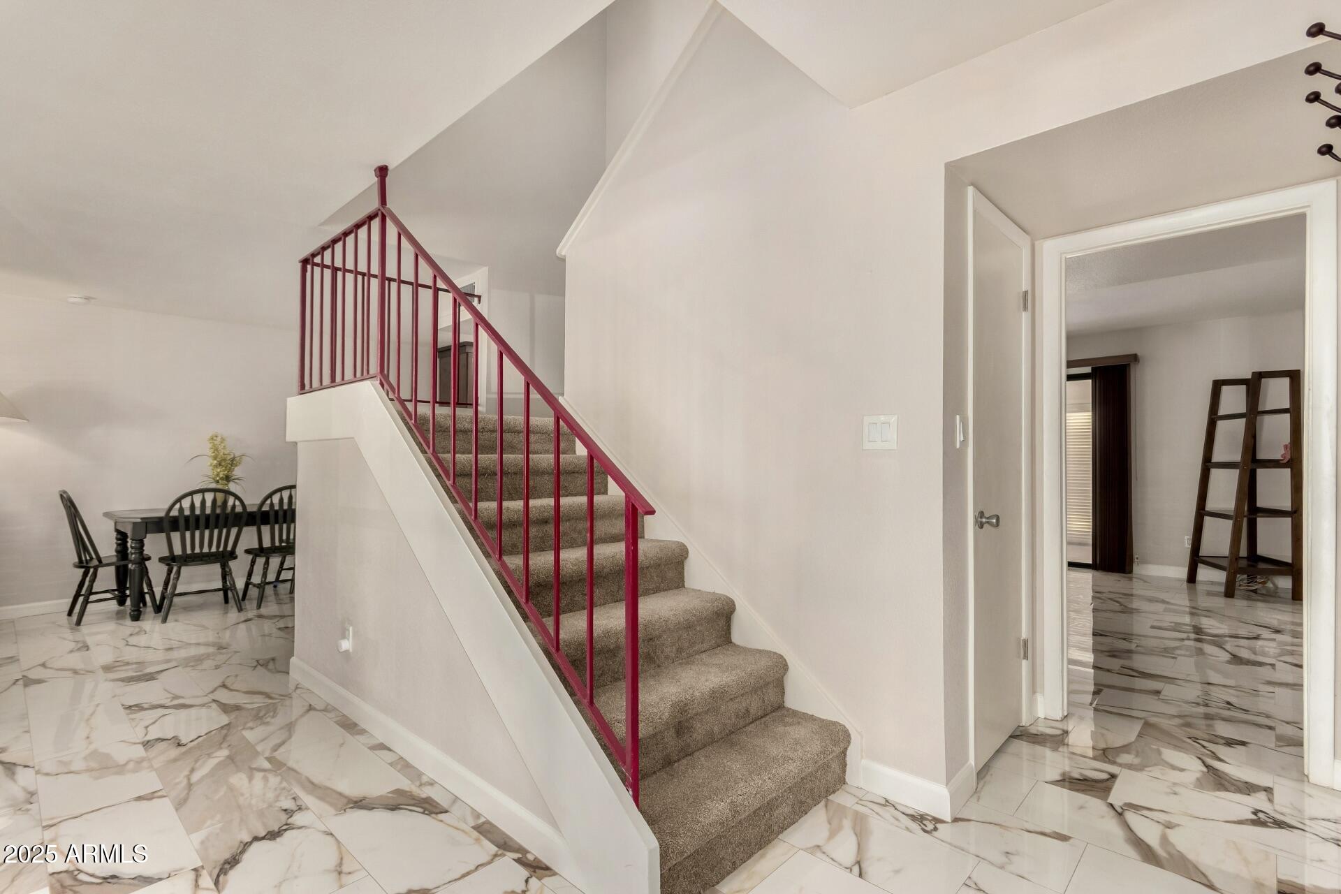 7729 E HARVARD Street