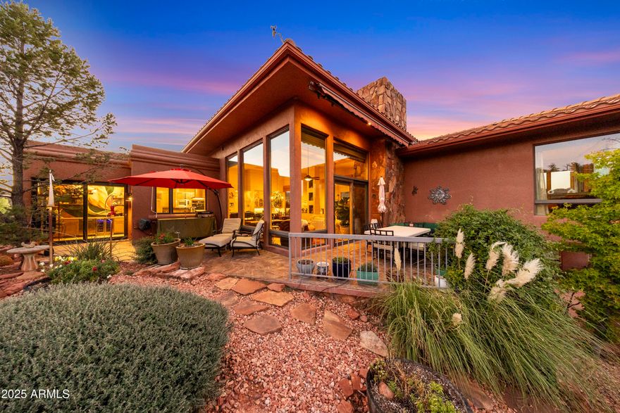PRICE IMPROVEMENT | 100 Penelope Way, Sedona -- $2,195,000
New to market at this price: This exceptional half-acre corner property now comes with a rare, grandfathered fenced yard for all future owners. This fence already exists, already complies, and conveys with the home permanently.

4 bed | 4 bath | half-acre corner lot | Sedona red rock views | private fenced yard | grandfathered and HOA-approved

YOUR SEDONA DREAM HOME AWAITS 
~A RARE RED-ROCK MASTERPIECE!
Escape to Unparalleled Beauty and Serenity:
Imagine waking each morning to panoramic views of Sedona's iconic red rocks - Elephant Rock and Cathedral Rock glowing in the sunrise to the east while Jerome's rugged peaks frame vibrant sunsets to the west. This one-of-a-kind architectural treasure, bathed in natural light... through floor-to-ceiling Pella windows, transforms everyday moments into unforgettable experiences. Savor morning coffee on your east-facing patio as the sun rises over Elephant Rock, or unwind on the elevated herb garden patio, where western sunsets paint the sky in hues of orange, pink and twilight blue with wildlife grazing nearby.  Picture al-fresco dining as the Golden Hour turns your million-dollar view into solid golden vistas.

A HOME DESIGNED FOR LIVING AND ENTERTAINING:
Step inside to an open-concept haven where modern luxury meets timeless charm. The heart of the home - a chef's kitchen, dining and living area - flows effortlessly, perfect for hosting lively gatherings or intimate family moments. Freshly renovated, the kitchen boasts solid rain-forest acacia and teak wood bars, sleek granite countertops, a sprawling island and a show-stopping 9-foot coffee bar with a sink, dual-zone wine fridge and RO water system. Create culinary masterpieces with a 6-burner gas stove, griddle, pot filler, double ovens and Sub-Zero fridge - all designed to inspire.

The great room invites relaxation with a soaring 25 foot rock chimney and roaring fireplace, surrounded by elevated seating for cozy evenings under soft cove ceiling lights. Whole-home wired audio sets the perfect ambiance, while thoughtful details like display alcoves and a stunning foyer chandelier add sophistication and warmth.

PRIVATE RETREATS WITH JAW-DROPPING VIEWS
Four spacious bedrooms offer serene escapes each framing Sedona's breathtaking vistas. The fourth bedroom doubles as a luxurious guest suite, complete with its own living area, full bath and private patio opening to lush gardens - ideal for guests, in-laws or a personal wellness retreat. Fenced yard has been Grandfathered in by the HOA.

THE BEST OF SEDONA AT YOUR DOORSTEP
Nestled just 10 minutes from Sedona's vibrant downtown, this home offers the perfect balance of seclusion and convenience. World-class hiking and biking trails are steps away, while your exclusive community clubhouse elevates your lifestyle with a resort-style pool, tennis and pickleball courts, a fitness center, cozy library, card room and a grand fireplace for neighborhood gatherings.

LIVE THE SEDONA LIFESTYLE
This isn't just a home - it's a sanctuary where luxury, nature and tranquility converge. With every detail crafted to inspire, this Sedona masterpiece is your chance to claim a slice of red-rock paradise. Schedule your private tour today and step into your forever home!