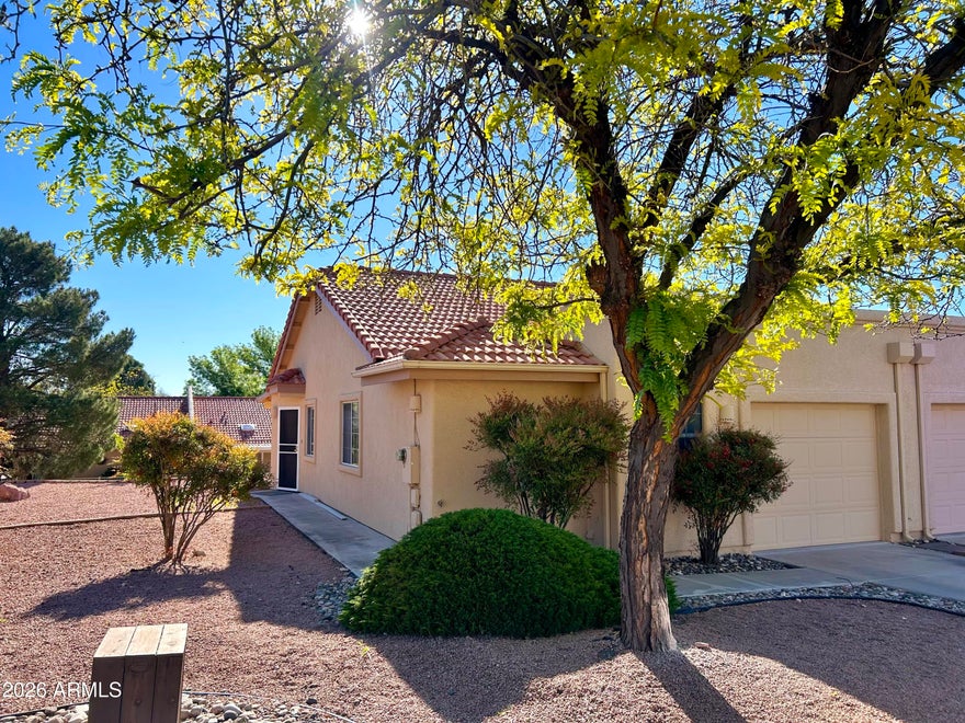 Welcome to your own slice of Arizona paradise! This beautifully renovated 2 bed, 1 bath patio home offers comfort, charm, and convenience in an unbeatable location. Just minutes from one of Arizona's most picturesque downtown areas and only 15 minutes from Sedona and Jerome, you'll enjoy mild year-round weather and endless dining, shopping, and outdoor options. Located less than a quarter mile from grocery stores, restaurants, and everyday amenities. Interior features include new laminate flooring, updated light fixtures, and fresh paint. Enjoy a cozy private back patio, perfect for relaxing or entertaining.