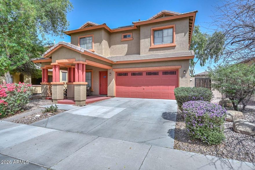Welcome to this beautiful 2-story home in the heart of Goodyear! Step past the spacious, welcoming front patio into this opportunity featuring two distinct living spaces and a formal dining room perfect for any buyer. The kitchen is open to the living space and is complete with a pantry, a central island, and views looking out to the backyard. Upstairs, the primary suite serves as a private retreat, with access to a balcony patio overlooking the outdoor space. Three additional bedrooms provide plenty of room for family, guests, or a home office. The large, private backyard has plenty of space for many activities. It features mature trees and plenty of room to play or relax. Thi home has a 2-car garage and solar panels for excellent energy efficiency. Don't miss this Canyon Trails gem!