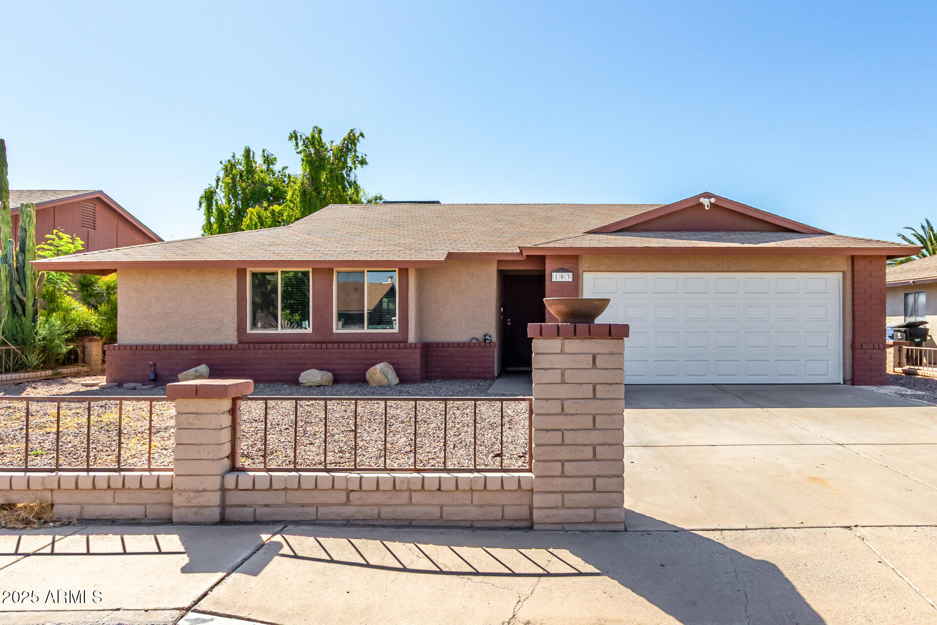 103 E MADISON Street