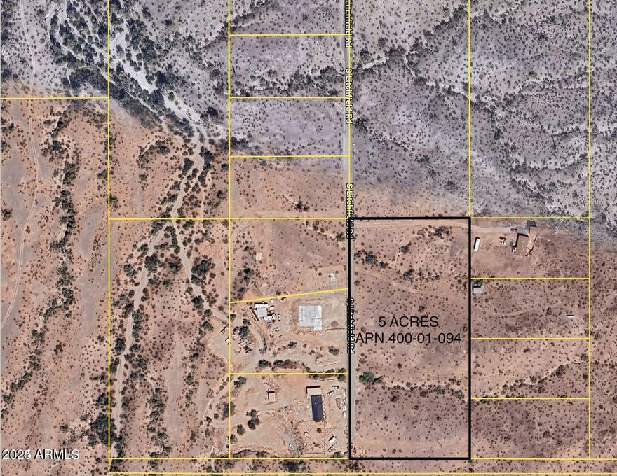 Build your dream home!  NO HOA.  Nestled in the heart of Goodyear, this expansive parcel offers a rare opportunity to build your own desert compound, or subdivide up to 5 lots.  Bring your horses, toys and RVs.  Close to Raceway-Estrella Mountain Park & Golf.  360 degree mountain views, great city lights!  Abuts Estrella Mountain Regional Park with miles of riding trails.