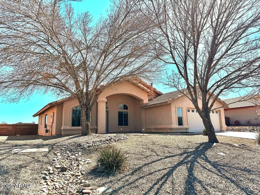 New FLOORING & WATER SOFTENER!!!! Owner has a portion of his equity financed with a FHA loan of 2.875% that he would allow buyers to assume. Buyers will have to qualify. This beautiful 4 Bedroom, 2 Bath, 2.5 Car Garage home is centrally located in Sierra Vista AZ and has everything you need! Close to schools, shopping and Fort Huachuca. The kitchen features granite countertops and stainless steel appliances.  The master features a walk-in closet, walk-in shower, separate bathtub, a bidet and dual sinks! This home also includes ceiling fans in every room, an epoxy floor in the garage, a Smart Honeywell Thermostat and beautifully landscaped front and back yard.