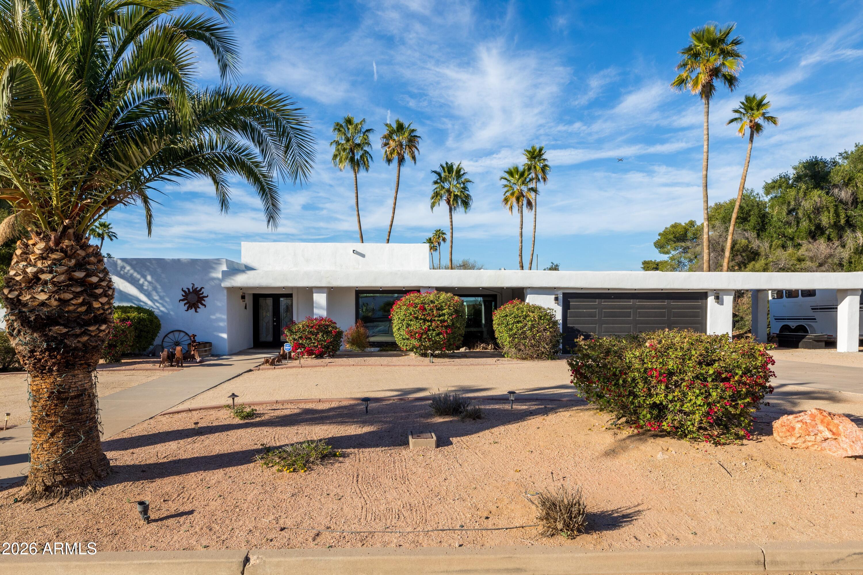 7014 E Sweetwater Avenue