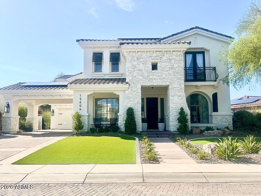 Experience luxury in this former TW Lewis Model in the gated Tapestry community of Vistancia. This Mediterranean-inspired home features a private courtyard with a Juliet balcony, wrought-iron gate, and French doors. Energy-efficient solar panels complement the timeless architecture. Situated on a large lot and walking distance to the Rec Center offering tennis, pickleball courts, community pool, and trails. The backyard oasis showcases a sparkling pool with water features, built-in BBQ station, sleek fire pit area, shaded patio, mature landscaping, turf, and travertine. The upgraded gourmet kitchen features KitchenAid appliances, updated backsplash, painted cabinets, and new faucet. Additional upgrades include remodeled guest bathroom, new carpet, updated interior and exterior lighting, new paint throughout, water filter system, and updated pool equipment.