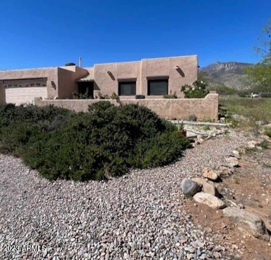Great home in the country but close enough to drive to Sierra Vista or Bisbee in short time. Fantastic floorplan and amazing mountain views! Add some TLC and this may be the perfect home for you. Call for a private tour today.