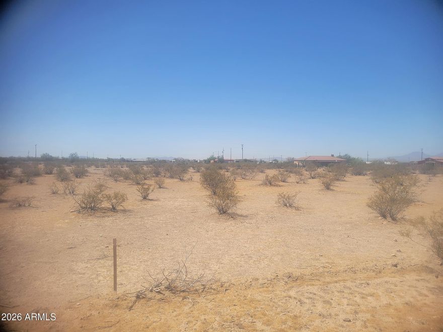What a find! A 2 acre corner lot located in Indian Valley Ranchettes. Minutes from Casa Grande and I-10 and easy access to Maricopa City. All roads are now freshly paved. Electric is right across the street too. The lot is square, clean and level, ready for your home. No HOA. Gorgeous mountain views! A must-see!