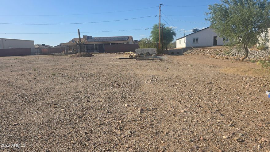 NO HOA! Don't miss this incredible opportunity to own a desirable parcel in a rapidly growing area. This spacious lot offers access to city of Surprise water service, with an electric pole and meter hookup already available in the easement, making it even easier to start building.

Ideally located just minutes from Highway 60, the property provides convenient access to shopping, dining, and major travel routes while still offering the peace and privacy of rural living.

Whether you're looking to invest or build your dream home, this property is full of potential. Come explore the possibilities!