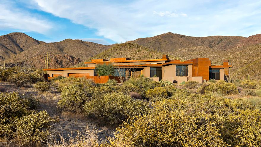 Welcome to the pristine setting of Desert Mountain's Cintarosa saguaro preserve, just steps from the community's private hiking trail system bordering Tonto National Forest. Take in the grandeur of magnificent mountain panoramas from the expansive poolside patio with additional covered outdoor living & dining areas. Enjoy grand city light views from the firepit setting on the sunset patio. Architect Terry Kilbane designed this home in today's trending style of modern architecture, with simplicity of design and open living spaces that complement the serene Sonoran Desert setting. Generous living spaces are appointed with the materials, finishes, appliances and fixtures demanded by our discerning buyers. Stunning master suite with spa bath and fabulous closet space, a view office, and three private guest suites complete this picture-perfect desert retreat. Convenient to Cochise-Geronimo and Chiricahua clubhouses and golf courses. The 2.4 acre site with a building envelope of 31,000+ sf has ample room for a guest house expansion. View "Documents Tab" for location within Community and Village
