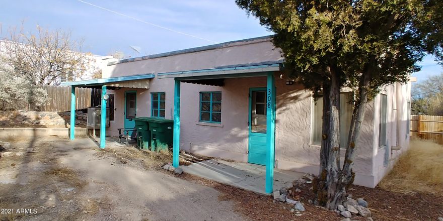 Here is a great property for a little price. This property would make a great Air B&B rental or live in one and rent the other. This property is within walking distance to the main tourist area of Tombstone and restraunts. Includes 306 and 308 E Safford.