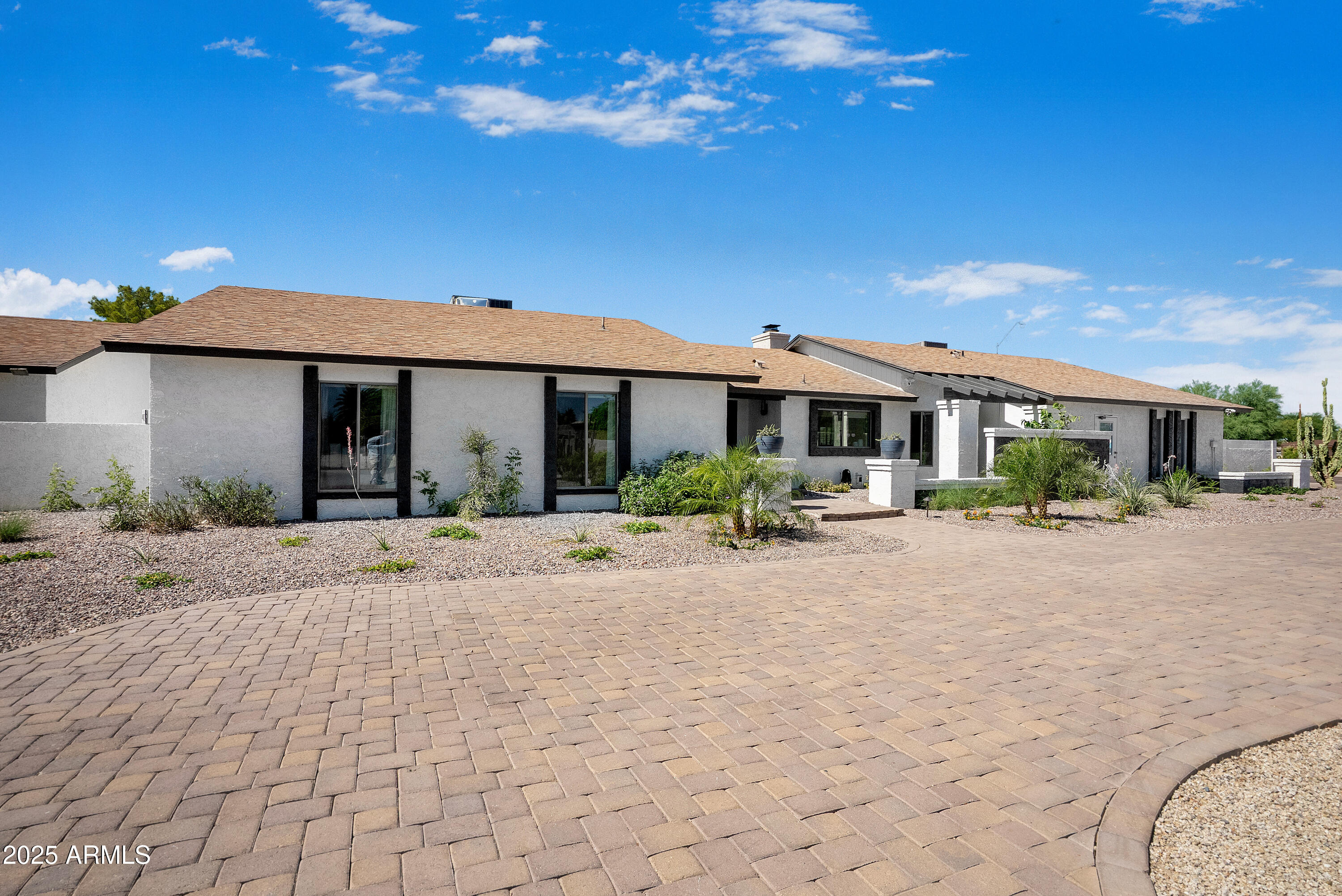 8001 E VOLTAIRE Avenue