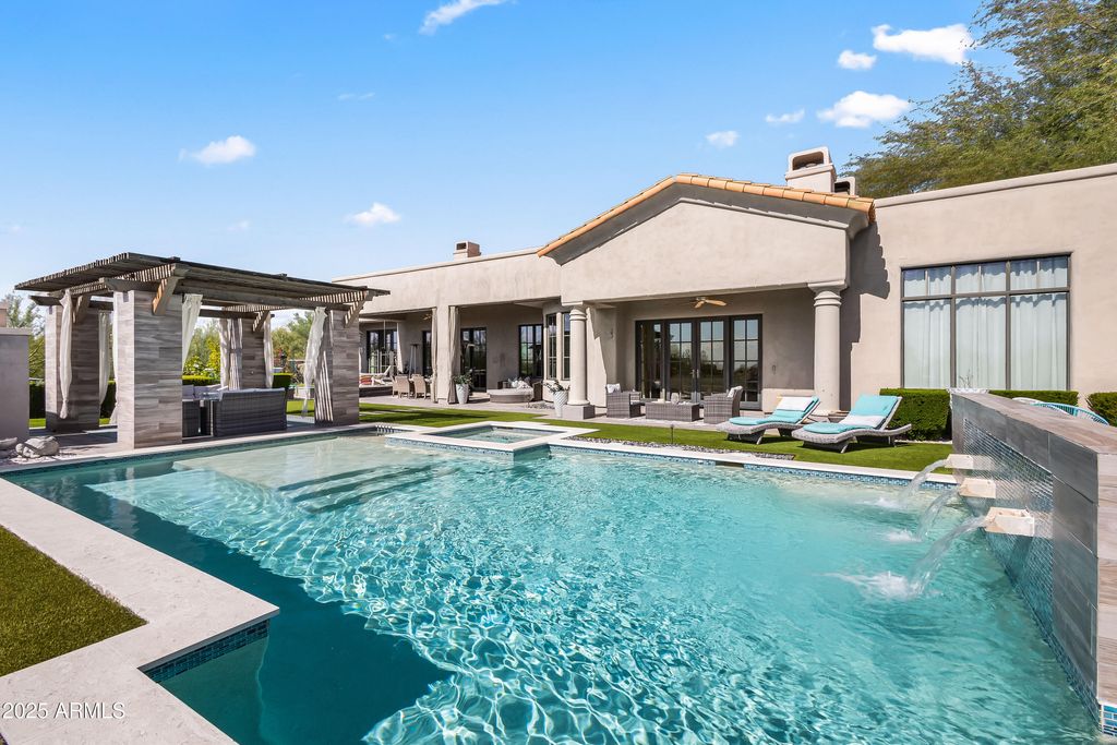 Photo of 9290 E Thompson Peak Parkway #102, Scottsdale, AZ 85255 (MLS # 6919334)