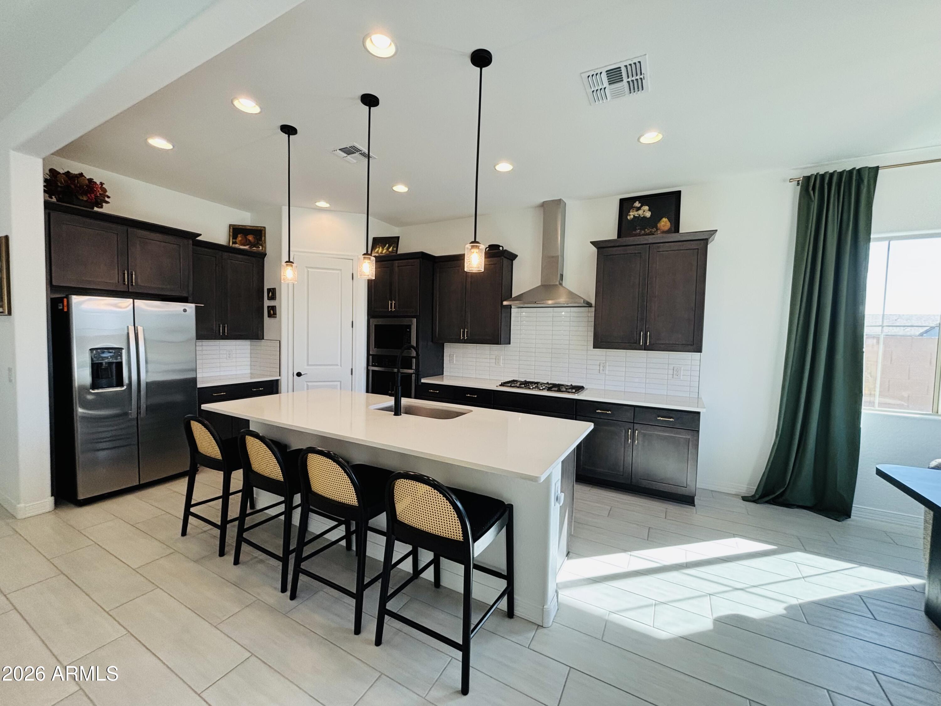 12005 W MARGUERITE Avenue