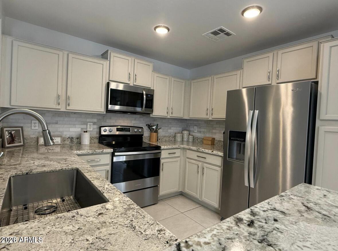 11578 W Carol Avenue