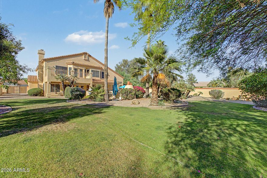 Finley Farms | Nearly Half-Acre Lot | New Roof | New A/C | Pool | 4-Car Garage | 5 Bed. This expansive home offers just under 4,000 square feet of living space, along with the recent updates that matter most, including a new AC system and brand new roof! Inside, you'll find generous living areas, a well appointed kitchen with granite countertops and ample storage, and a flexible floor plan ideal for multi-generational living, home offices, or guest accommodations. The backyard is the real standout, offering an incredible amount of space that is hard to find in central Gilbert. Complete with a private pool and plenty of room for entertaining, play areas, a garden, outdoor kitchen, or future upgrades, it gives you the flexibility you've always wanted. Additional highlights include a 4 car gar., RV gate and pad, north/south exposure, and a convenient location near schools, parks, dining, shopping, and everything Gilbert has to offer. With its size, oversized backyard, updates that matter most, and established Finley Farms location, this home is a standout opportunity in the middle of Gilbert.