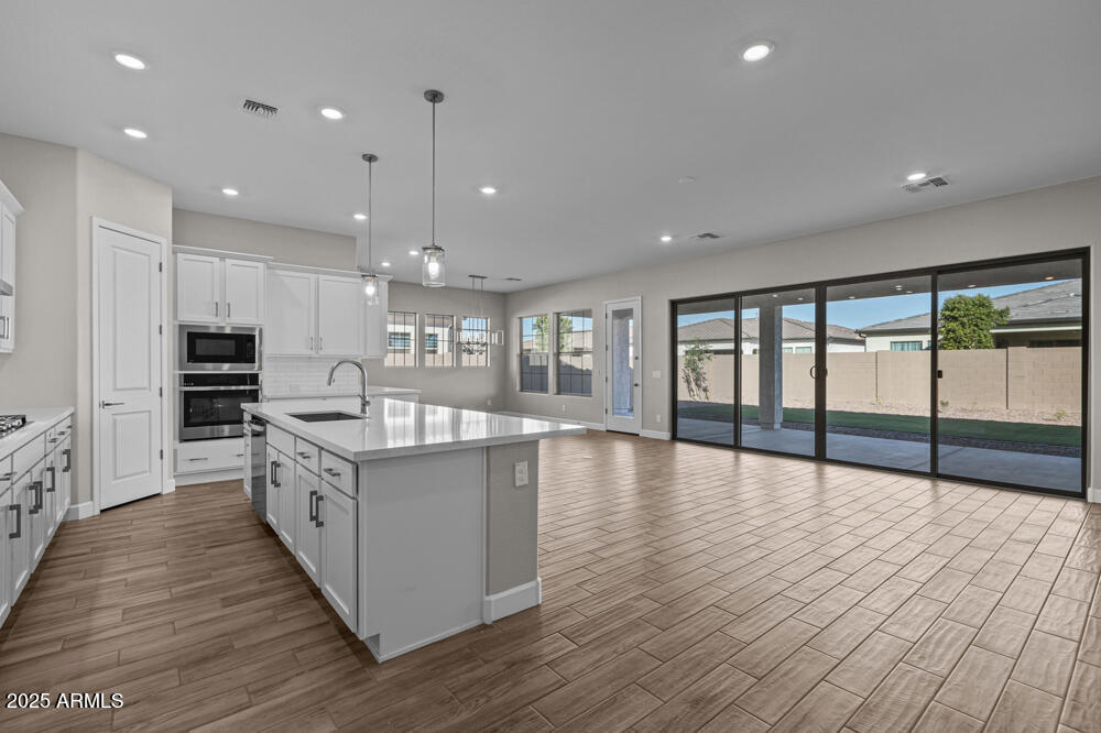 12312 W LUXTON Lane
