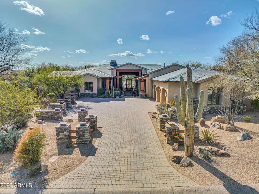 Golf Course and Mountain VIEWS in Grayhawk! AN EXQUISITE LABLONDE HOME RE-INTRODUCING THE 'ARTS & CRAFT' ARCHITECTURE OF THE 1910'S! ARTISTIC AND AESTHETICALLY ELEGANT FROM THE WELCOMING IRON GATE ENTRY TO THE UNIQUE SLATE ROOF TO THE EXTENSIVE USE OF WOODWORK (CUSTOM CABINETS, BEAMS, COLUMNS, DOORS, AND BASEBOARD) SET AGAINST COOL LIMESTONE FLOORS AND SURROUNDS TO A CHEF'S DREAM KITCHEN TO AN ELEGANT MASTER SUITE. OTHER LUXURIOUS FEATURES INCLUDE WET BAR, GUEST SUITES, POOL/SPA/WATER FEATURES, 4 FIREPLACES + MORE! Home is also available for lease, please inquire for leasing terms. Beautiful LaBlonde Custom Home on the golf course. HOME ON 3/4 ACRE OFF THE 6TH GREEN OF THE RAPTOR Golf Course.  Yes, there is a golf course view in the backyard.  Mountain views in the front yard. From the moment you enter the custom gate, you'll be mesmerized by the intricate details throughout this home, separating it from any other in the entire subdivision. Open floor plan makes this home great for entertaining, including a wet bar and formal dining room complete with cozy fireplace and fantastic views and exit to the incredible backyard. Gourmet kitchen complete w/ 2 dishwashers a warming drawer & butler's pantry; let's not forget a huge island w/ gas cooktop & separate sink. Dining area has additional custom built cabinets & custom chandelier. All bedrooms are ensuite, & the master has many extras including a wet bar, library, steam shower & fireplace. Entertainers backyard w/ pool/spa & built in bbq under a pergola. Enjoy gorgeous sunsets. Must see to appreciate!
