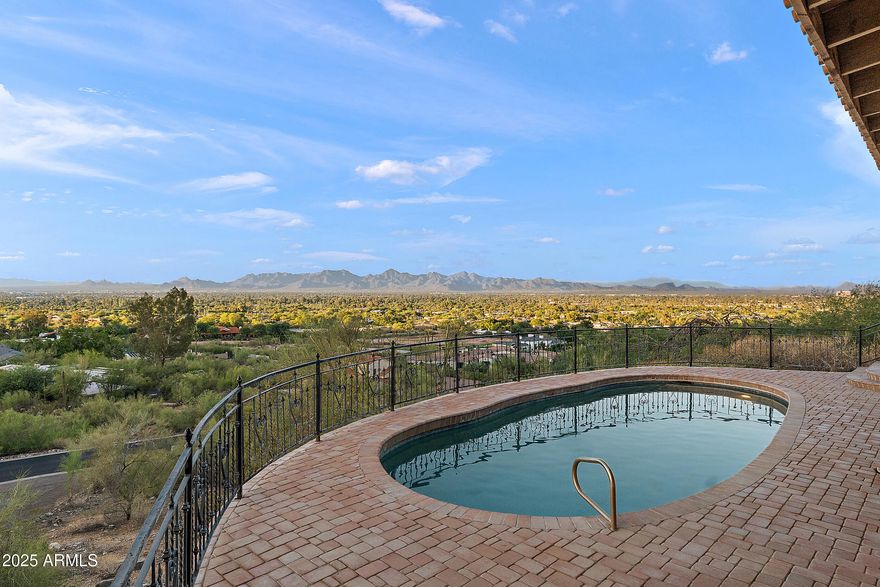 First Time Ever on the Market! Perched high on the coveted north side of Mummy Mountain, this original 4 bed, 3 bath, 3,154 sq ft hillside gem offers jaw-dropping panoramic views of Pinnacle Peak, Tom's Thumb, McDowell Mountain, and Four Peaks. Built in 1978 and untouched since, this one-of-a-kind Paradise Valley retreat is a rare opportunity to own a piece of mountain-side history with endless potential. Don't miss your chance to reimagine this iconic view home!