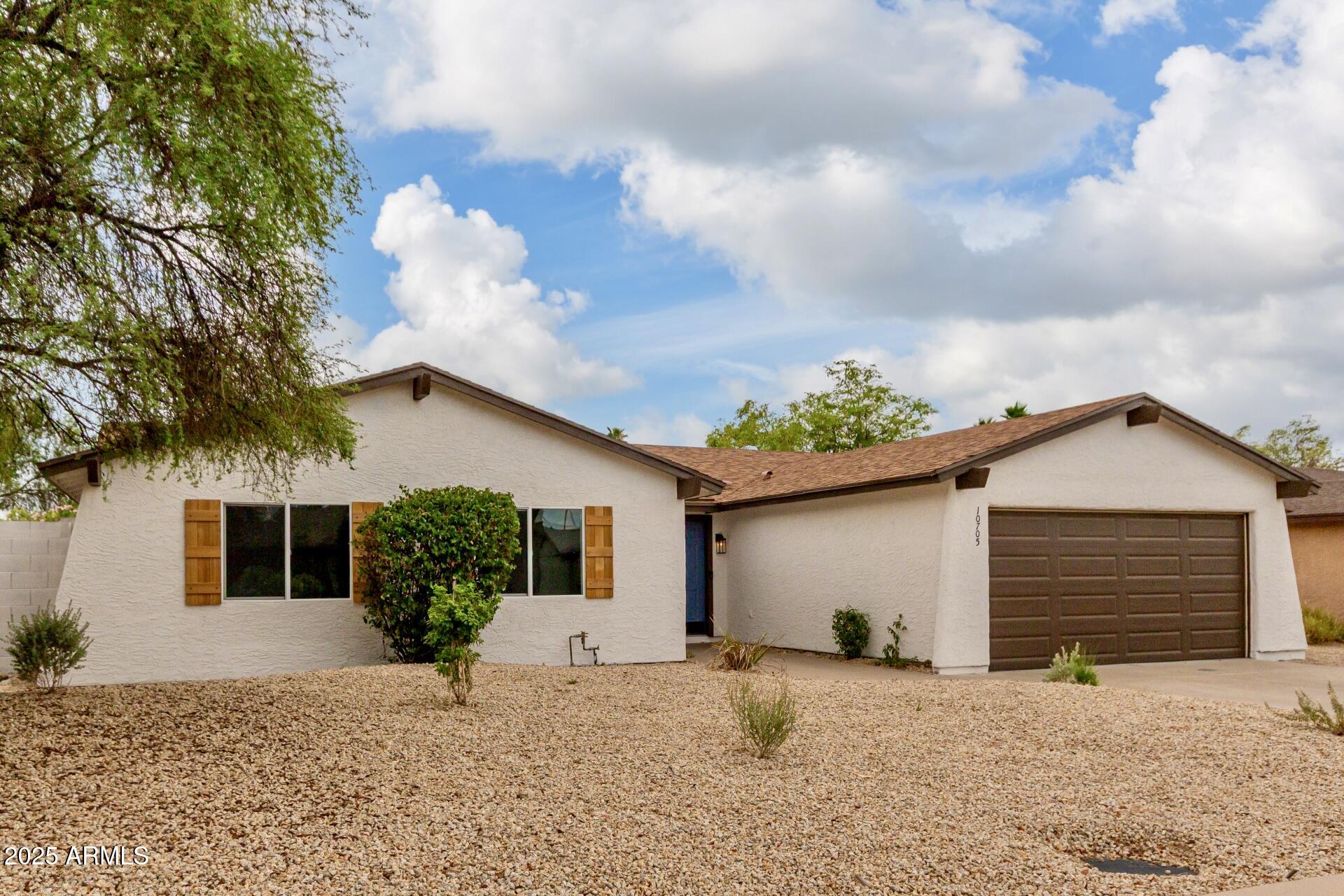10705 E MERCER Lane