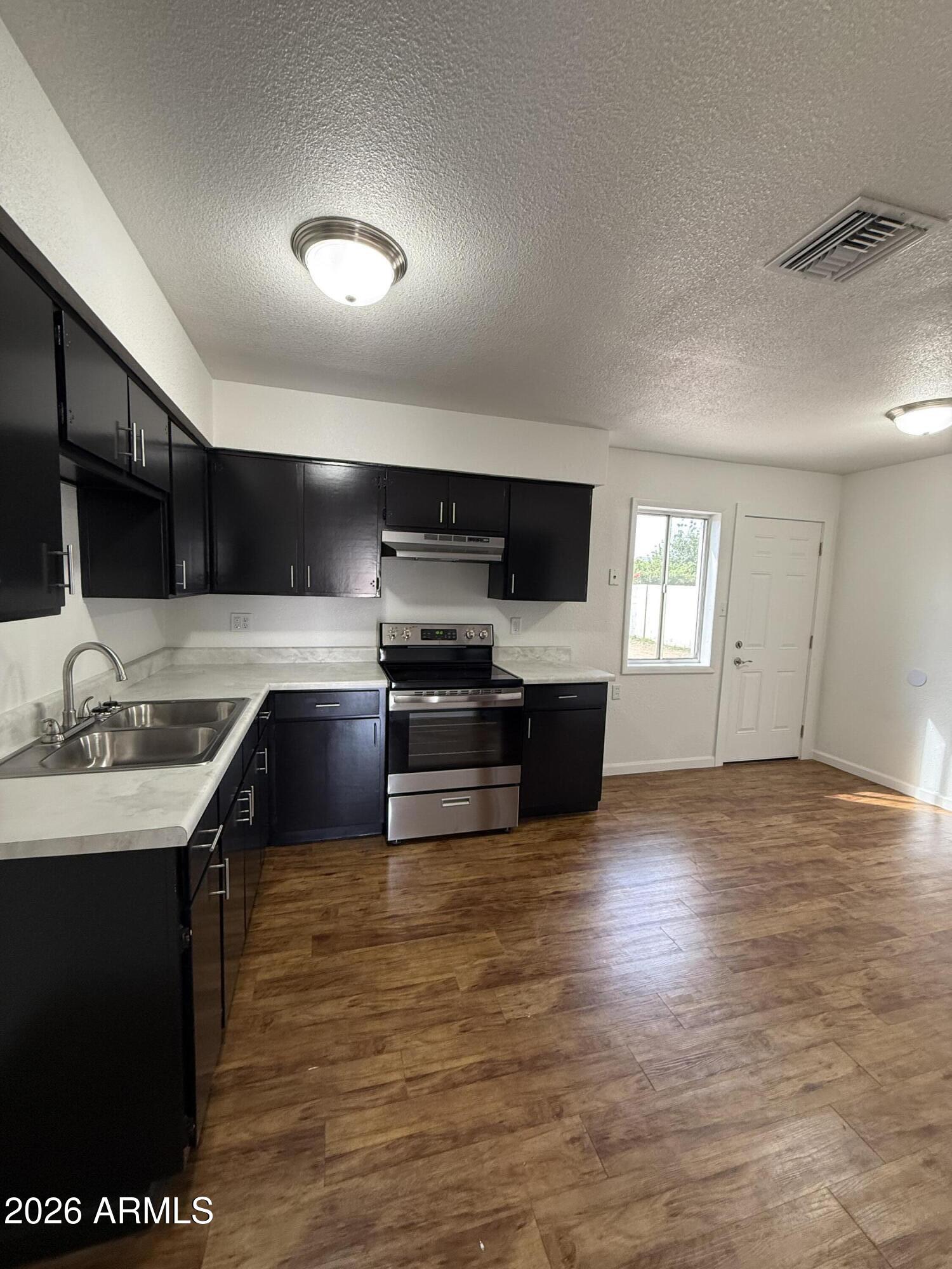 5807 W FLOWER Street