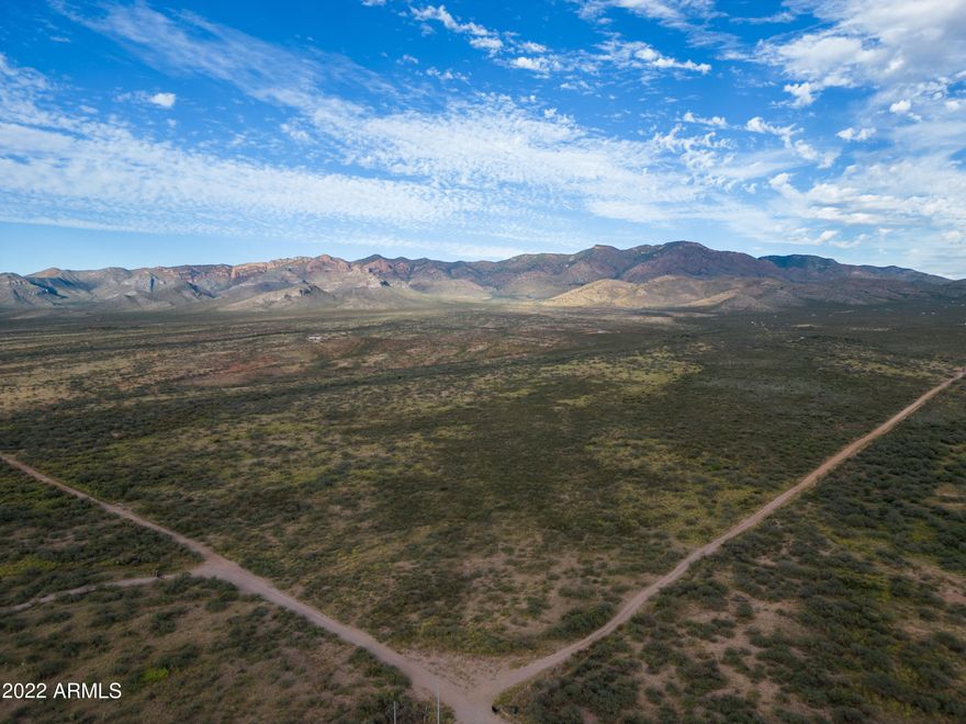 Enjoy panoramic views and complete privacy on 244 acres of land! SELLER MAY CARRY!!! Build your dream home or bring your recreational vehicles, or both! Sale includes an additional 8 acre parcel on N. Apache Trl. Experience the solitude and natural beauty of this large acreage landscape, all within an easy drive to Bisbee.