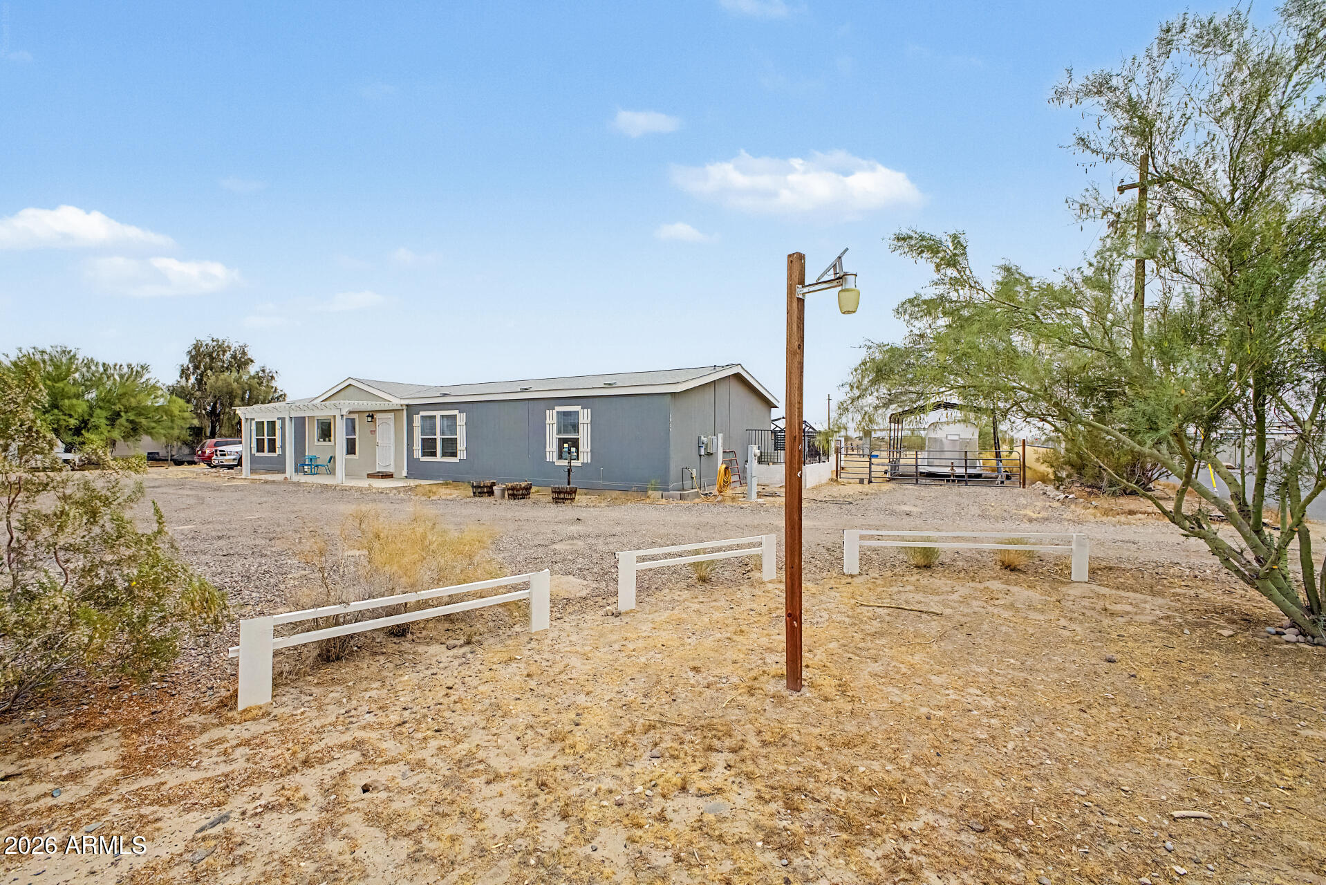 11637 W HARMONY Lane